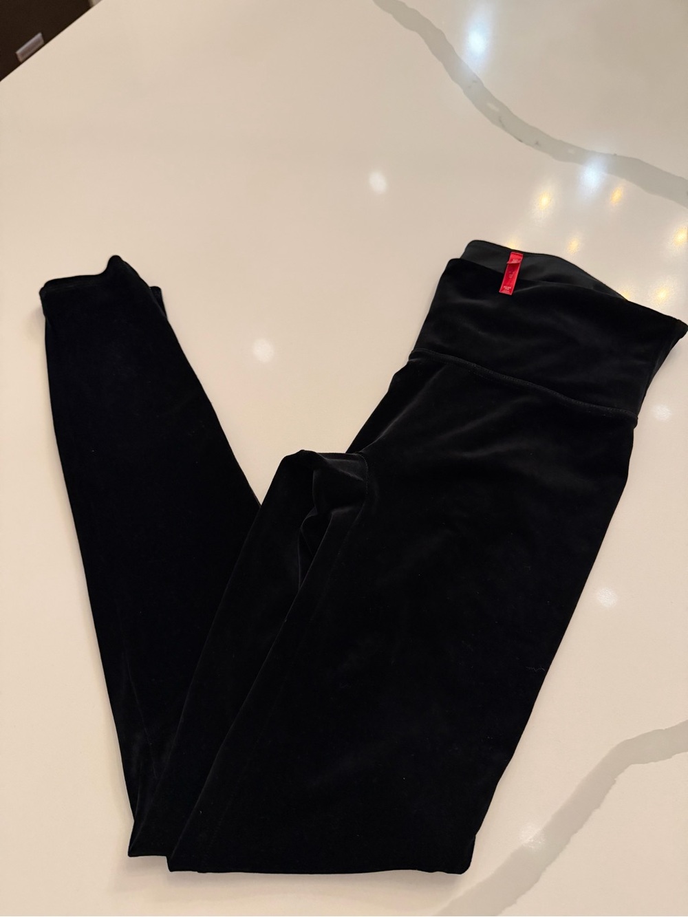 SPANX Velvet Leggings in Black with Red Tag